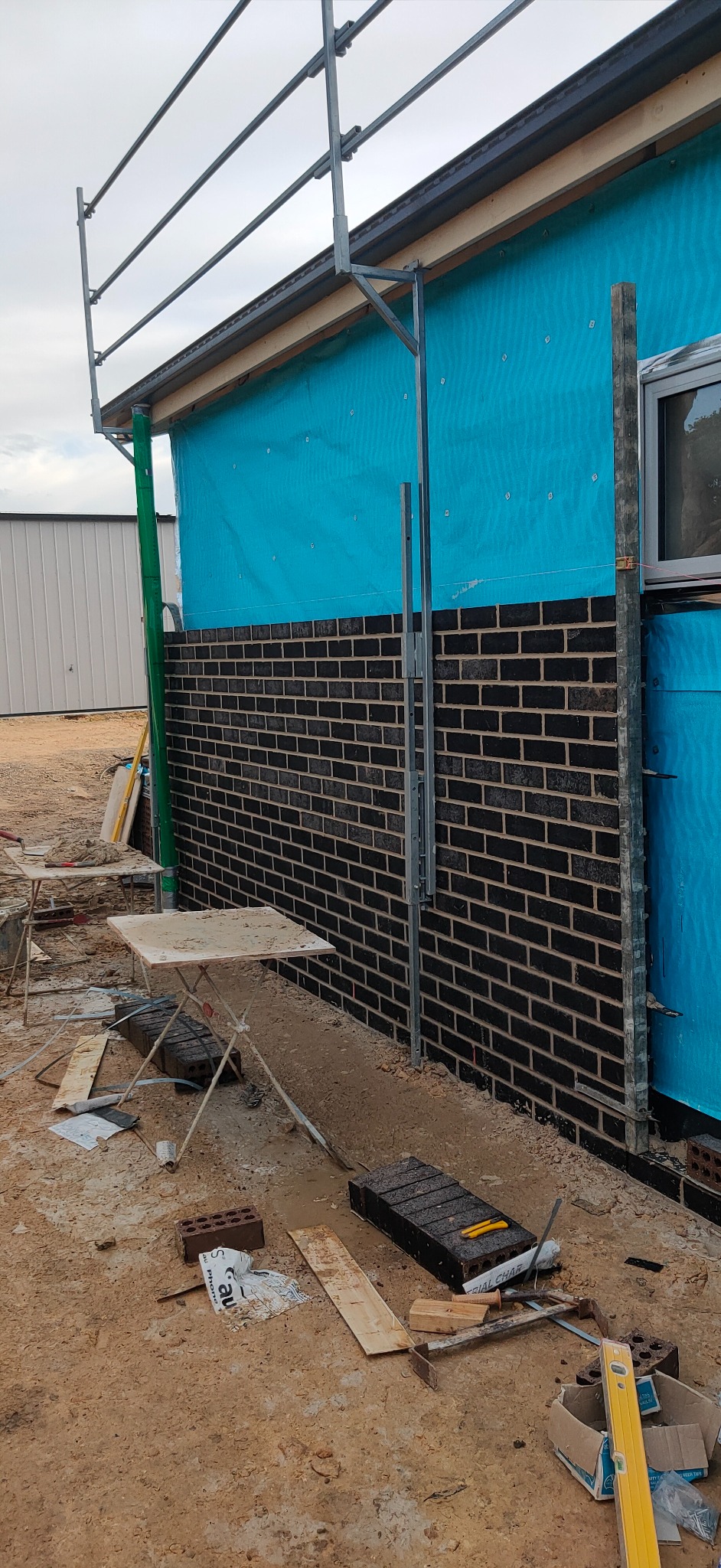 Dark brickwork under construction