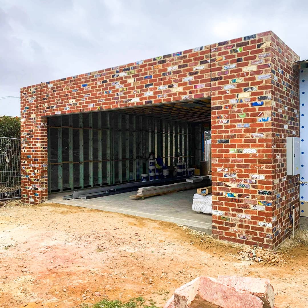 Recycled red brick garage opening