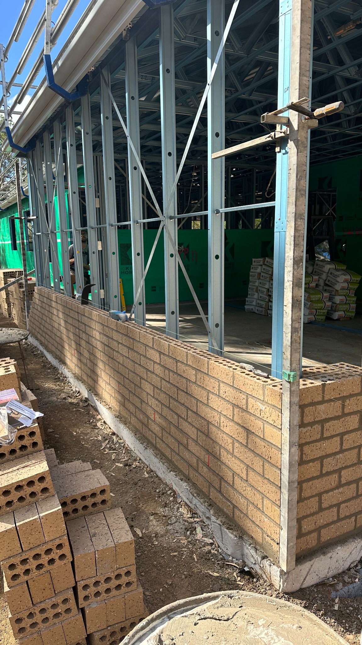 Brown brick wall under construction