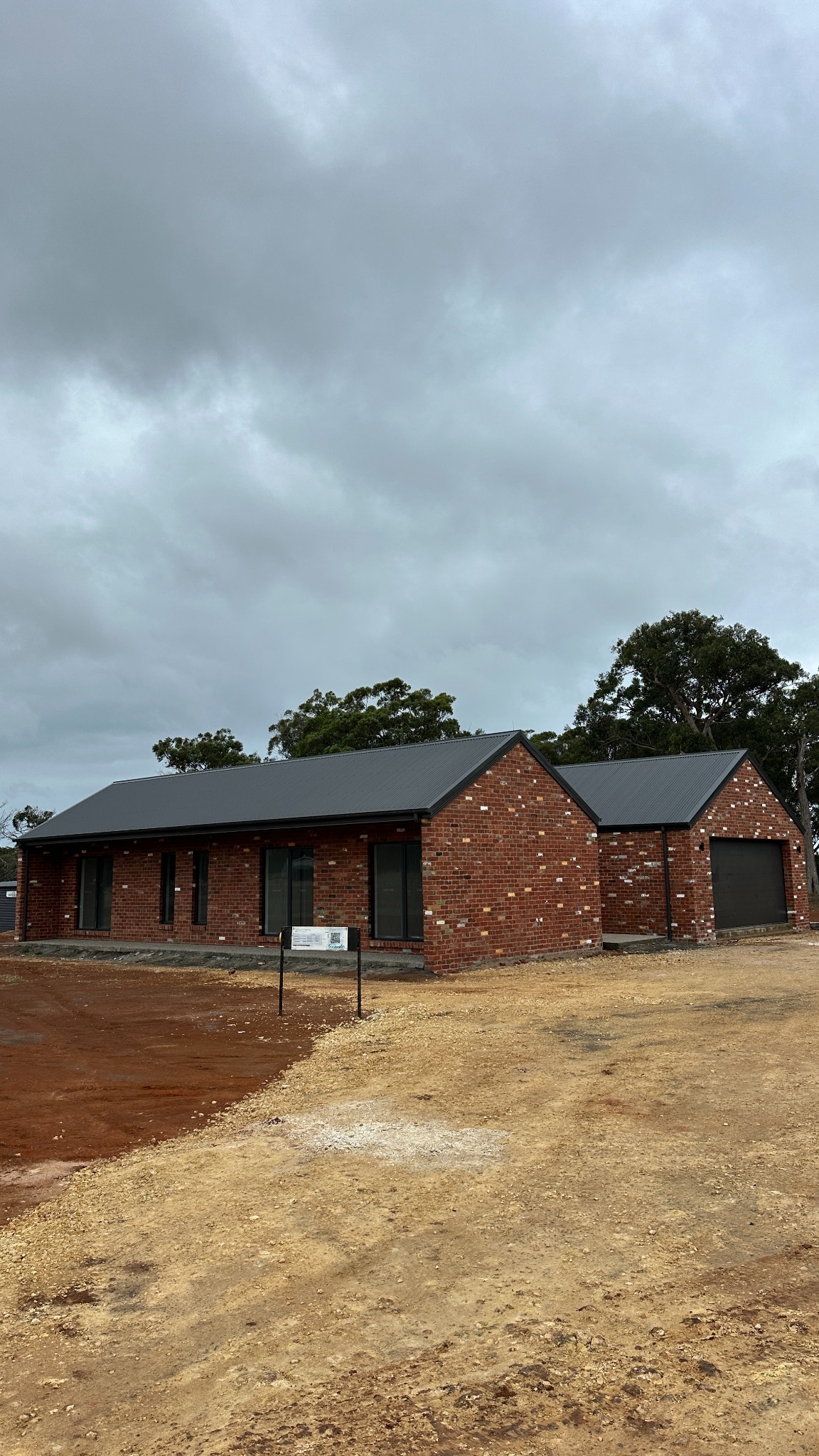 Recycled brick home and garage