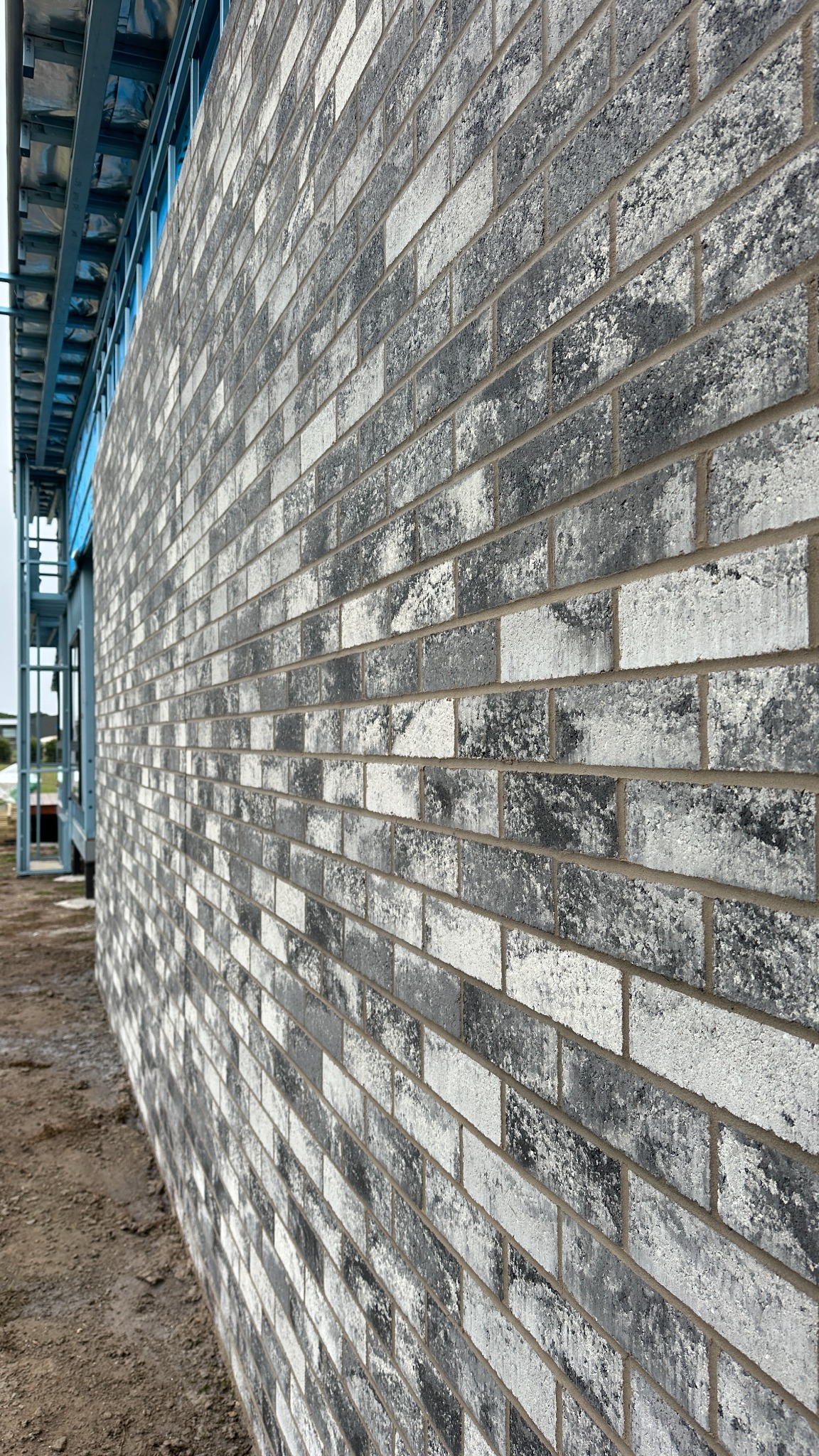 Grey and white feature brick wall